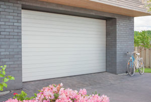 Комфортный «дом для авто»: как выбрать оптимальные размеры гаражных ворот и при этом сэкономить