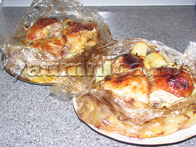 Куриные бедра, запеченные с овощами в рукаве