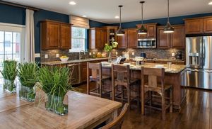 20 стильных деревянных кухонь