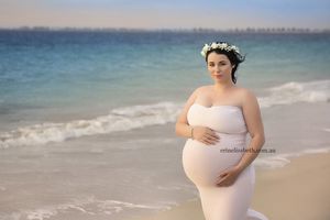 Фотосессия женщины, которая беременна пятерняшками