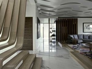 Уникальный дом: волнообразная лестница как центр интерьера