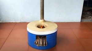 Идея для дачи: компактная печка из металлической бочки
