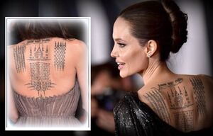 Как Анджелина Джоли пыталась спасти «татуировкой верности» брак с Брэдом Питтом