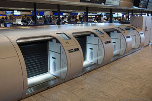 Автоматическая система приема багажа в аэропорту Нарита